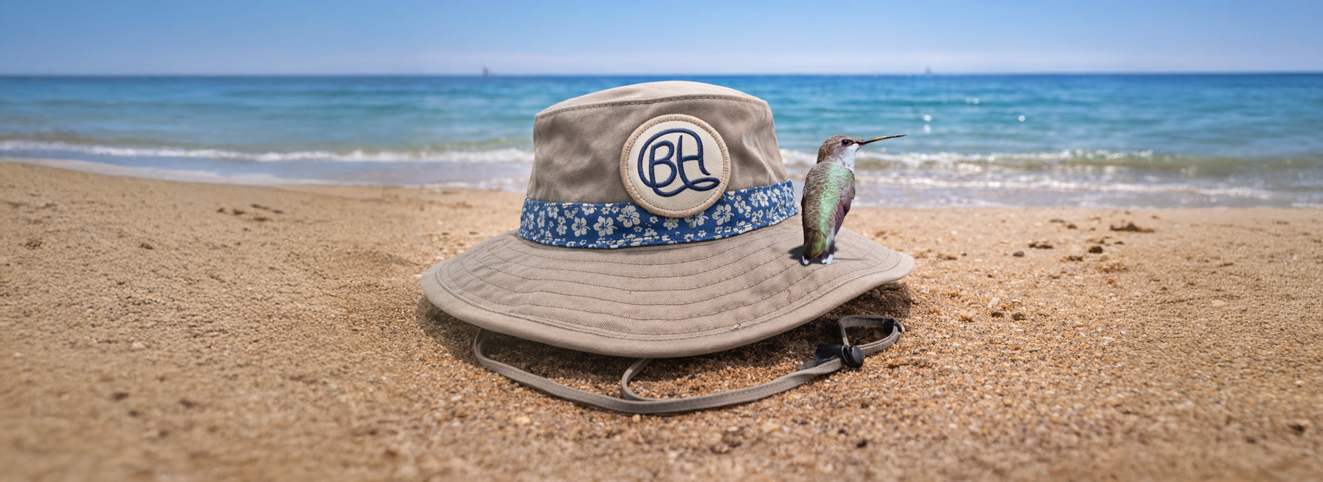 Background image of a cap with a leather patch on a post with hummingbirds hovering around it